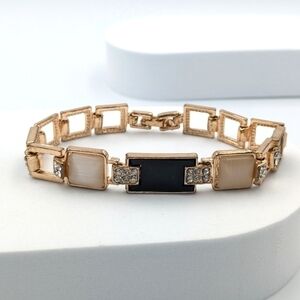 4/24$ 🌻 Rose gold tone panel bracelet with rhinestones